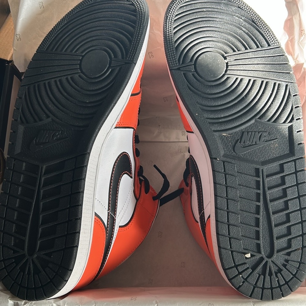 Nike  Jordan Black and Orange mid Sneakers